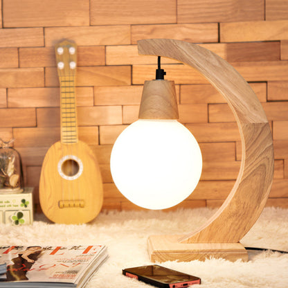 Lampe de table arquée en style scandinave design moderne