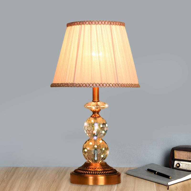 Lampe de table élégante forme conique cristaux taillés