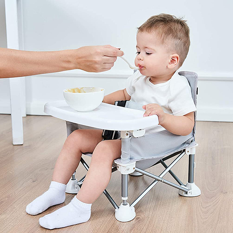 Verhoger voor kinderstoel aan tafel
